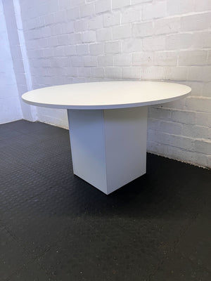 Stylish Round White Table with Modern Design and Minor Scratches