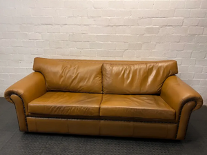 Tan 3 Seater Couch with Scrolled Arms and Stud Detail — Fair Condition