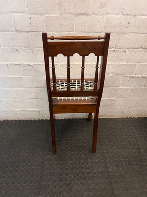 Traditional Brown Wooden Dining Chair with Woven Seat — Overall Good Condition