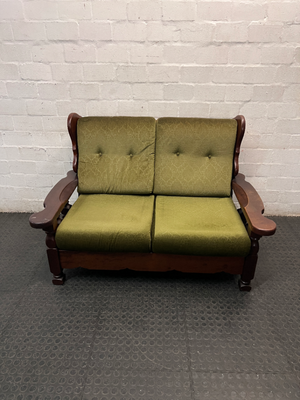 Vintage Style Green Fabric 2 Seater Couch with Wood Frame — Aged State with Scratched Woodwork