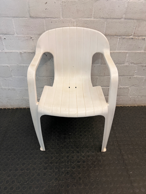 White Moulded Plastic Outdoor Armchair — Surface Wear and Cracks