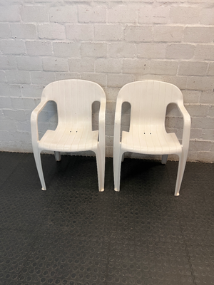 White Moulded Plastic Outdoor Armchair — Surface Wear and Cracks
