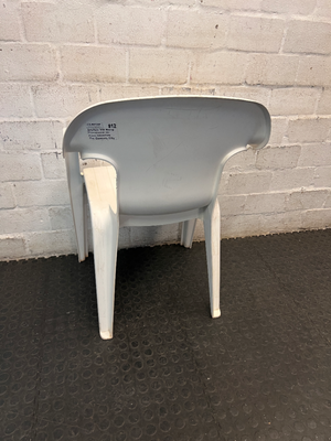 White Moulded Plastic Outdoor Armchair — Surface Wear and Cracks