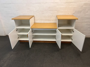 White and Oak-Toned Tiered TV Unit with Cupboards — Used; Fair Condition