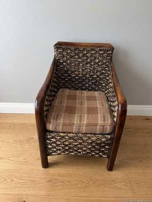 Woven Wicker and Dark Wood Armchair — Fair Used Condition with Faded Cushion