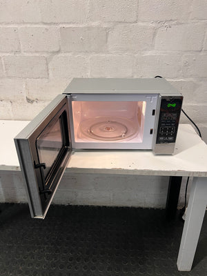 AEG Countertop Microwave with Mirrored Finish — Working; Well Used Condition – side view