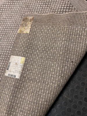 Large Woven Beige Area Rug — Well Used Rug – top view