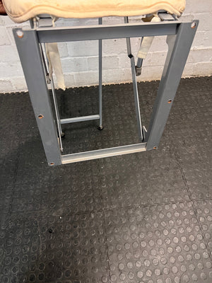 Grey Metal Folding Ironing Board — Fair Condition with Visible Surface Staining – side view