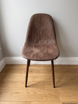 Moulded Tan Faux-Leather Dining Chair with Tapered Legs – styled product image