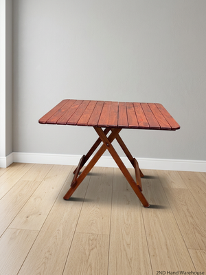 Foldable Slatted Timber Table in Warm Brown — Fair Condition with Visible Wear – styled product image