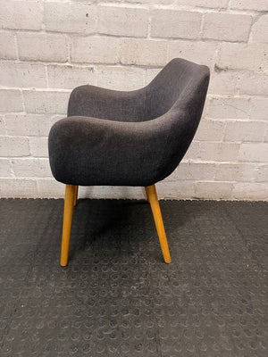 Grey Upholstered Mid-Back Chair with Wooden Legs — Damaged Back Leg – side view