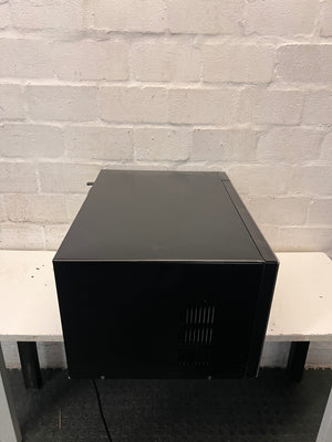 Samsung 55L Stainless Steel Microwave — Internal Light Inoperable and Slight Rust Inside – side view
