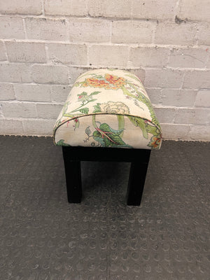 Floral Upholstered Ottoman with Black Timber Legs — Fair Condition With Visible Wear – side view