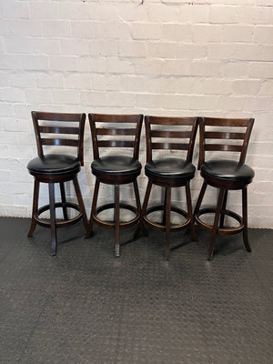 Dark Brown Wooden Bar Stool with Leather-Look Padded Seat — Frame Scuffs and Scratched Leather Seats – side view