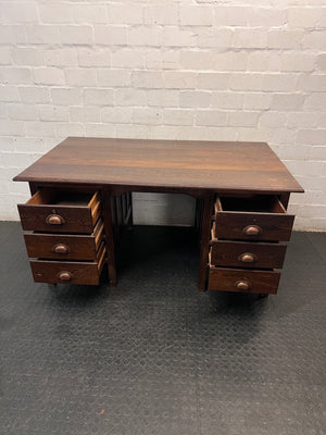 Classic Pedestal Wooden Office Desk with Cup Handles — Loose Top Surface and Age-Related Wear – side view