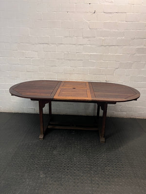 Oval Trestle-Style Wooden Outdoor Dining Table — Aged Wood with Worn Surface Finish – condition detail