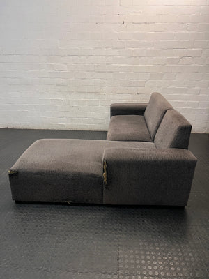 Grey Textured Fabric L-Shape Couch — Damaged and Worn Condition – side view