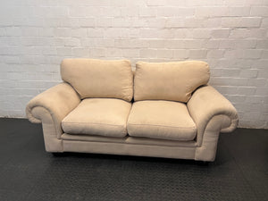 Beige Slouch Style 2 Seater Coricraft Couch — Small Mark on One Cushion – top view