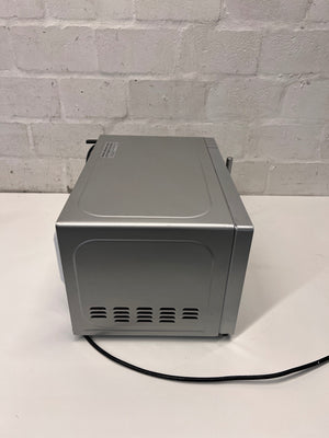 Silver Russell Hobbs Mirror Microwave — Working Well with Slight Surface Rust – top view