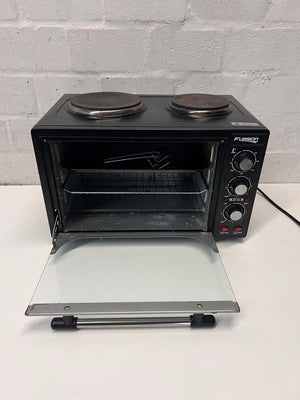 Black Fussion Two-Plate Countertop Stove and Oven — Working Order with Visible Rust – side view