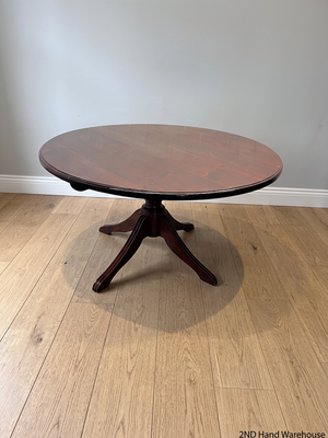 Round Wooden Pedestal Dining Table in Dark Brown — Clean and Well Maintained – styled product image
