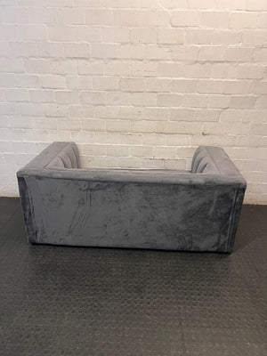 Grey Two Seater Couch with Vertical Stitching — Upholstery Has Wear and Tear – condition detail