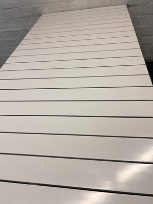 Cream Slatted Metal Outdoor Table — Well Used with General Outdoor Wear – top view