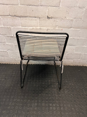 Black Steel Frame Dining Chair with Beige Cushion — Well Used State – back view