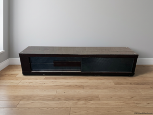 Sleek Black Glass-Top TV Unit with Storage — Good Working Order – styled product image