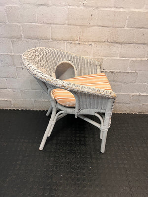 White Wicker Armchair with Striped Cushion — Wicker Coming Undone on Chair Back – back view