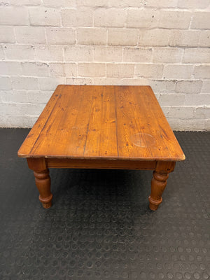 Rustic Wooden Coffee Table with Turned Legs — Surface Scratches and Water Stain on Top – back view