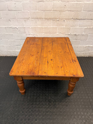 Rustic Wooden Coffee Table with Turned Legs — Surface Scratches and Water Stain on Top – side view