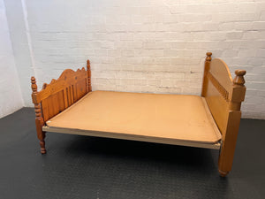 Honey Oak Queen Bed Frame with Spindle Detail — Damaged Mattress; Frame in Good Condition – side view