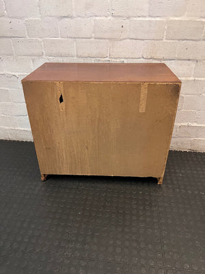 Four-Drawer Wooden Chest with Curved Metal Handles — Damaged with Significant Veneer Loss – back view