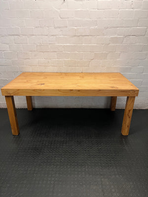 Rustic Oak-Tone Wooden Dining and Work Table — Unfinished Wood with Paint Splatter and Water Rings – condition detail