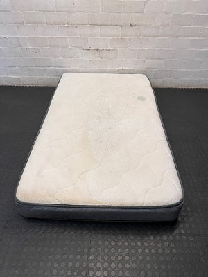 Single White and Grey Quilted Mattress — Surface Burn Mark and Water Damage – top view