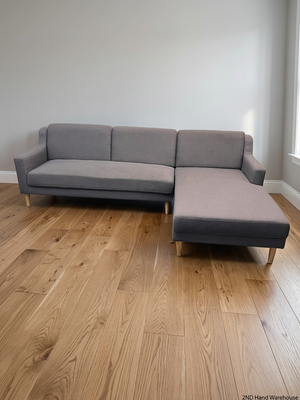 Grey L-Shaped Sectional Couch with Tapered Wood Legs — Cut at Base and Missing Attachment Bracket – styled product image