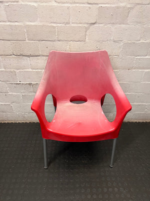 Modern Red Moulded Plastic Chair with Metal Legs — Faded Red Chairs in Fair Condition – main front view