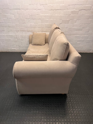 Beige Upholstered 2 Seater Couch with Rolled Arms — Very Good Condition – side view