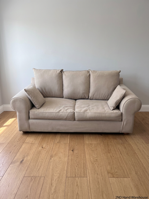 Beige Upholstered 2 Seater Couch with Rolled Arms — Very Good Condition – styled product image