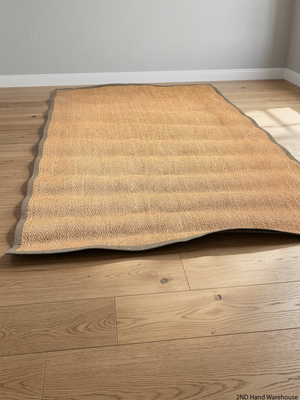 Large Woven Brown Area Rug with Fabric Border — Fair Condition with Visible Wear – styled product image