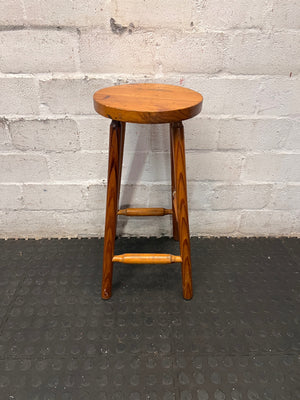 Classic Brown Wooden Bar Stool with Round Seat — Worn Condition with Structural Wear – main front view