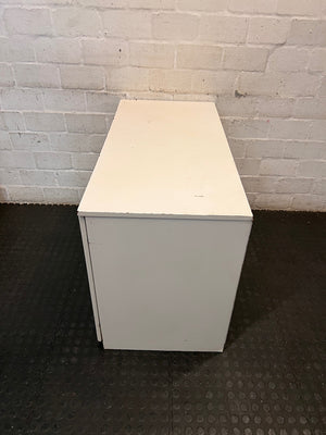 Compact White Office Desk with Right-Hand Pedestal — Visible Wear and Structural Damage – condition detail