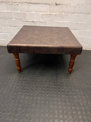 Brown Upholstered Square Coffee Table with Turned Legs — Well Used Condition – main front view