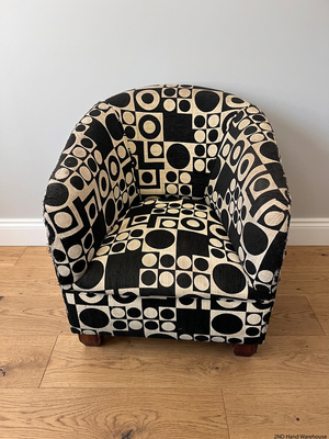 Geometric Pattern Tub Chair with Wooden Feet – styled product image