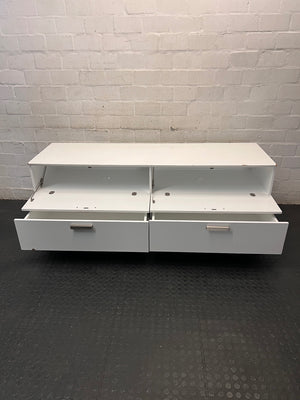 White Four-Drawer TV Unit with Metal Handles — Minor Bump Damage on Front Corners – side view