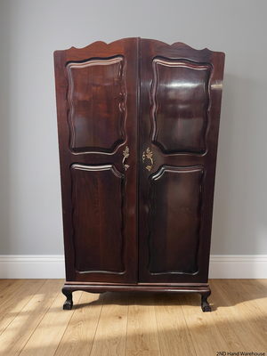 Classic Dark Wood Armoire with Scalloped Top — Well Used Wardrobe with Visible Wear – styled product image