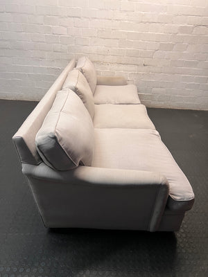 Light Grey 3 Seater Couch with Feather Inner — Visible Wear and Minor Stains – back view