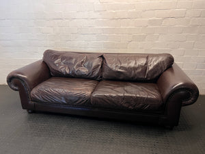 Coricraft Brown Leather 2 Seater Couch with Stud Detail — Broken Zip on Seat Cushion – main front view