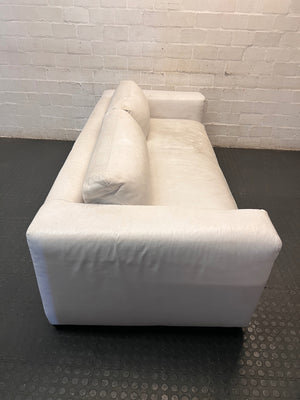 Modern White Leather 3 Seater Couch — Well Used With Significant Surface Wear – back view